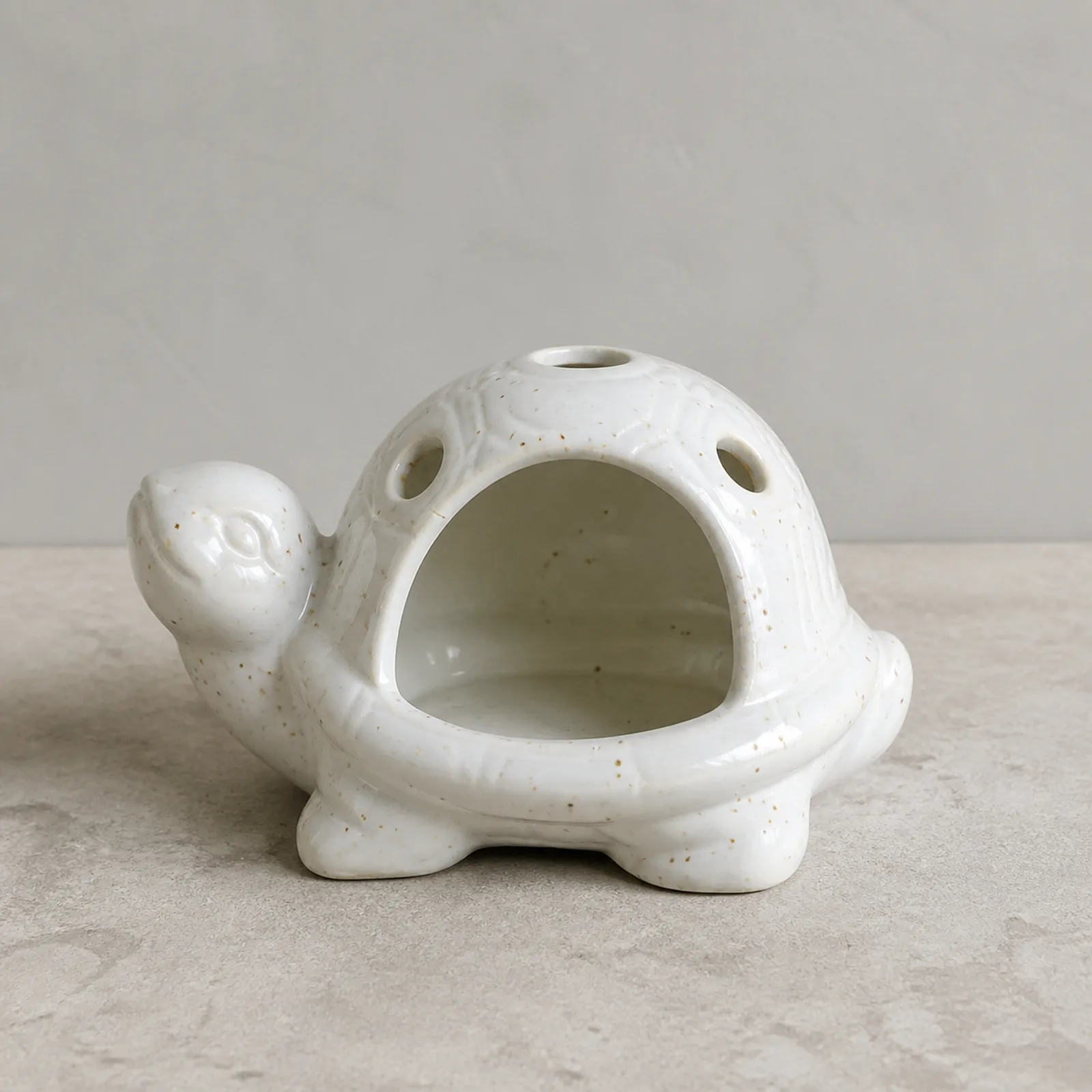 White speckled ceramic turtle Palo Santo holder clean front view