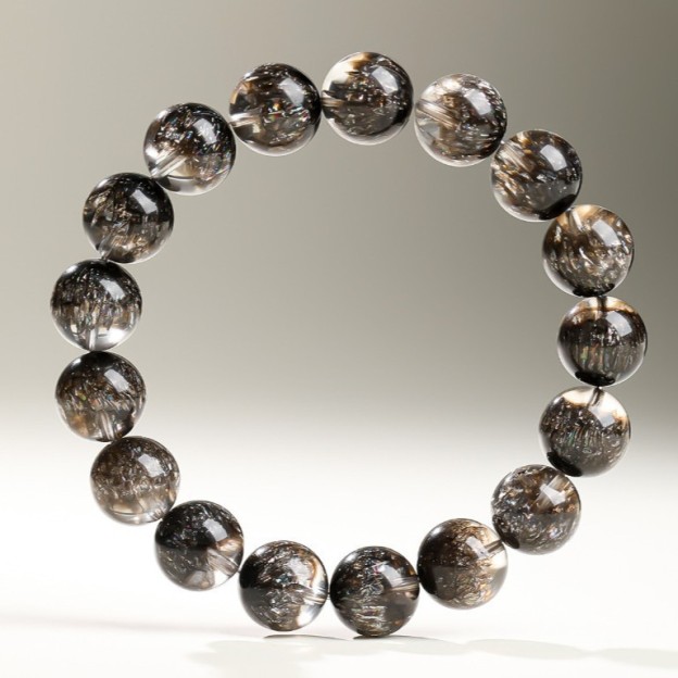 Stellar Abundance: 8MM Black Super Seven Sphere Bracelet for Manifestation & Cosmic Flow