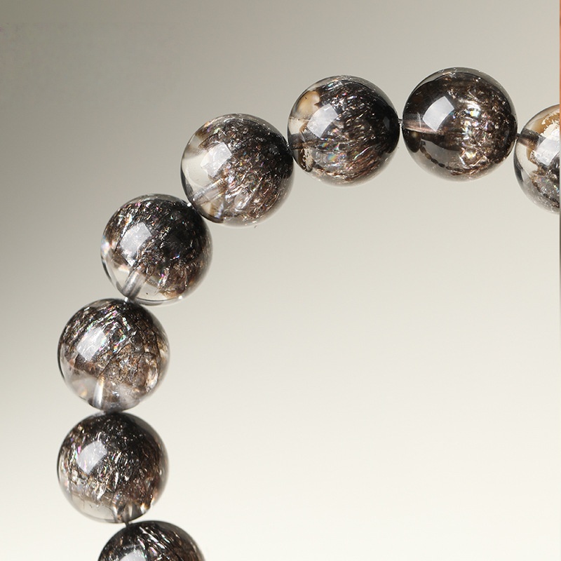 Stellar Abundance: 8MM Black Super Seven Sphere Bracelet for Manifestation & Cosmic Flow