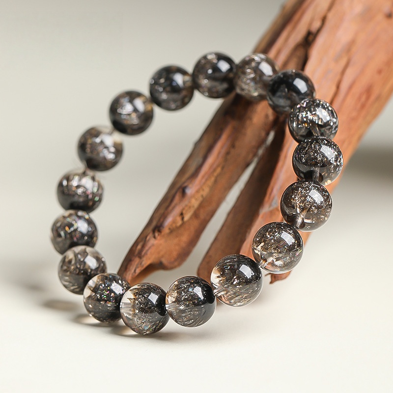 Stellar Abundance: 8MM Black Super Seven Sphere Bracelet for Manifestation & Cosmic Flow