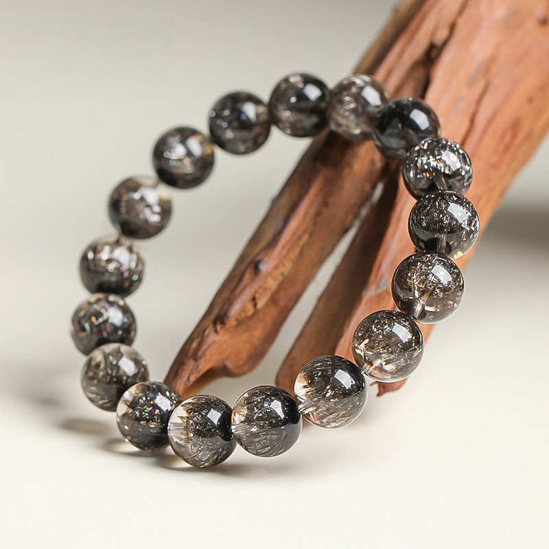 Stellar Abundance: 8MM Black Super Seven Sphere Bracelet for Manifestation & Cosmic Flow