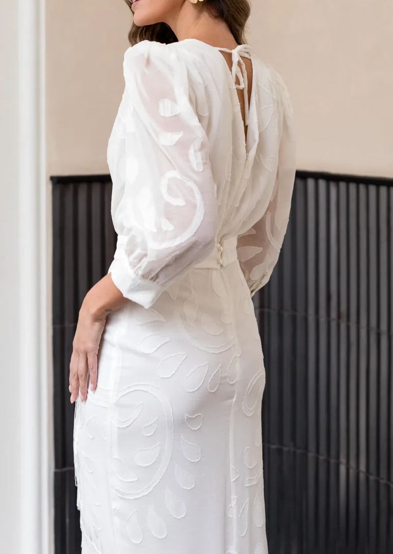 White brocade dress with fringes