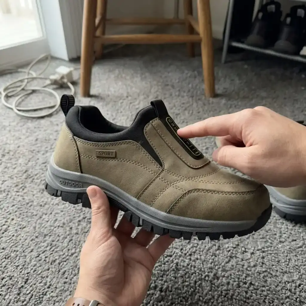 Customer holding the shoe