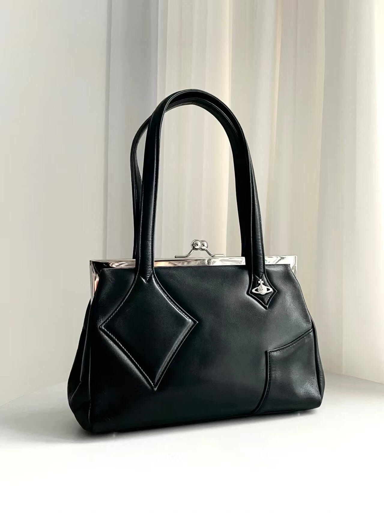 Vintage Leather Saturn Bag