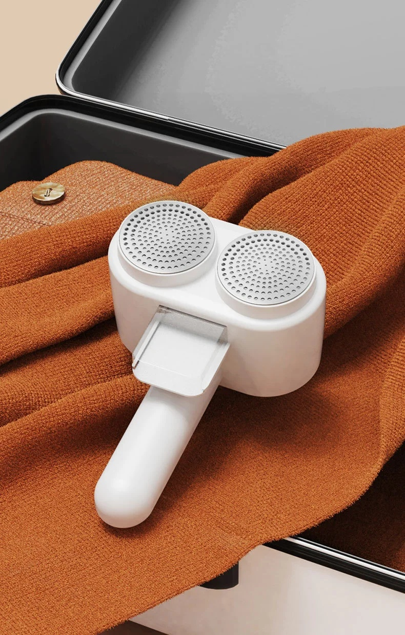 Leicht zu reinigender Haarklopfer mit Staubbox