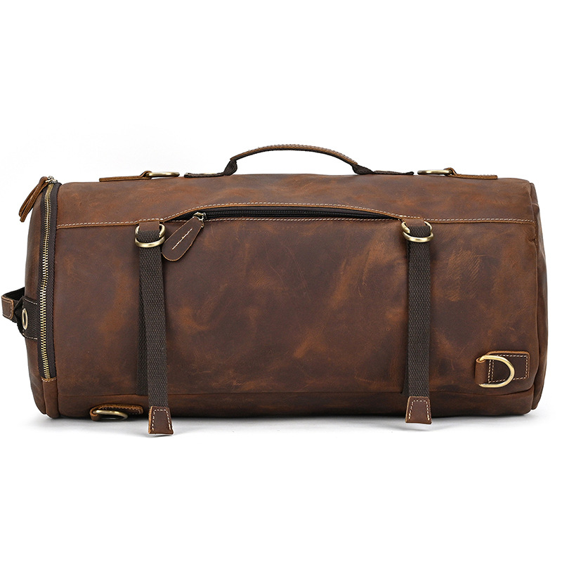 Vintage leather bag with brass D-rings and zipper pulls
