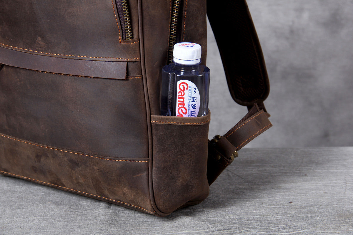 brown leather back pack