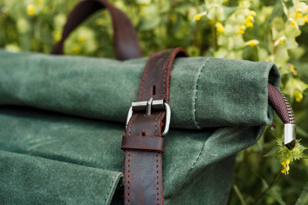 best canvas roll top bag with side-pockets for water-bottle