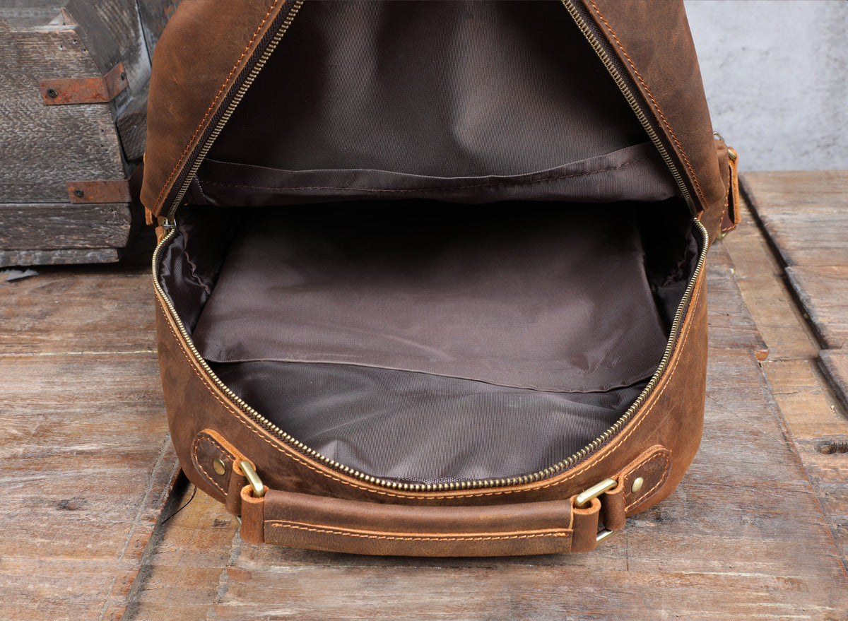 large cowhide leather garment-bag women with zipped pockets to securely transport a wallet, a coin purse, a card holder or sunglasses