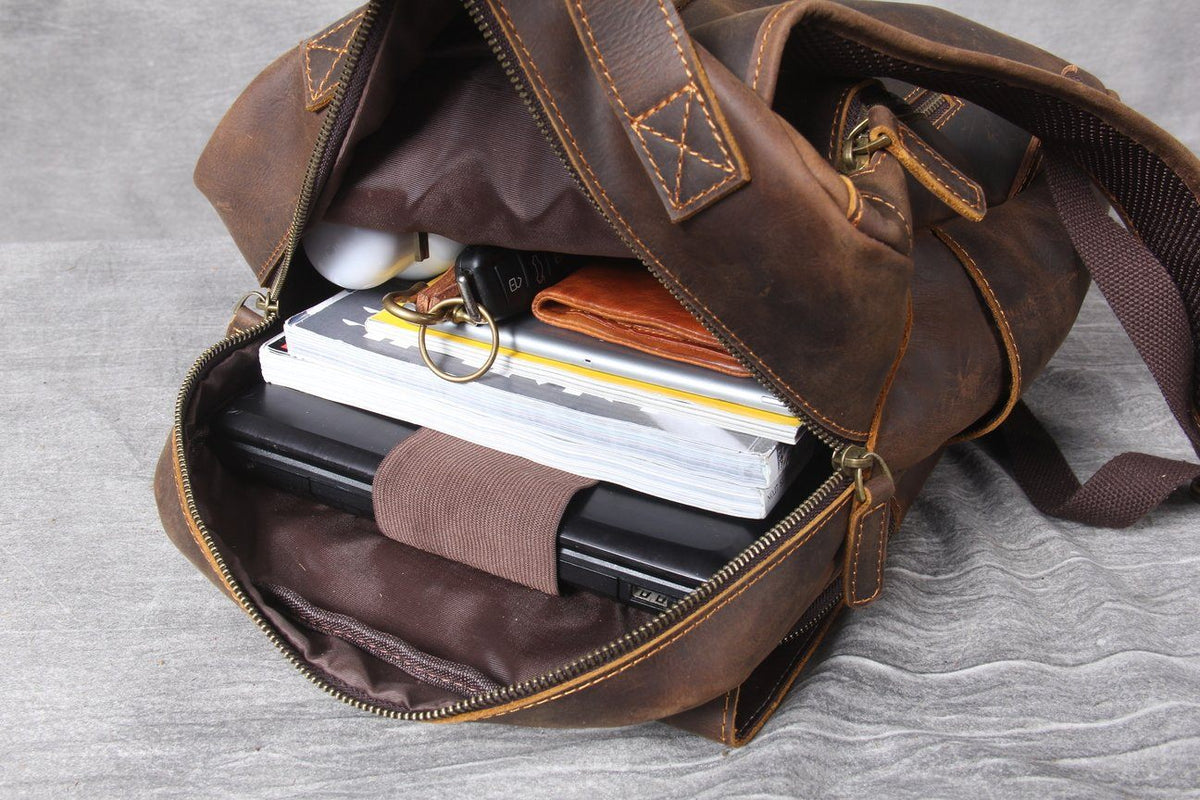 brown leather carry on travel backpack