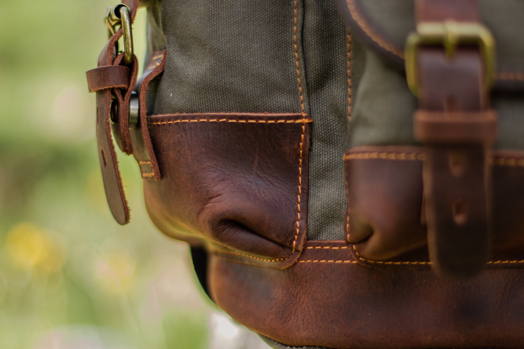 canvas hiking backpack worn with an oversized outdoor inspired look
