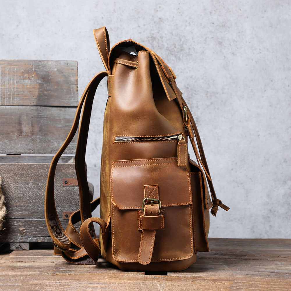 brown leather small backpack