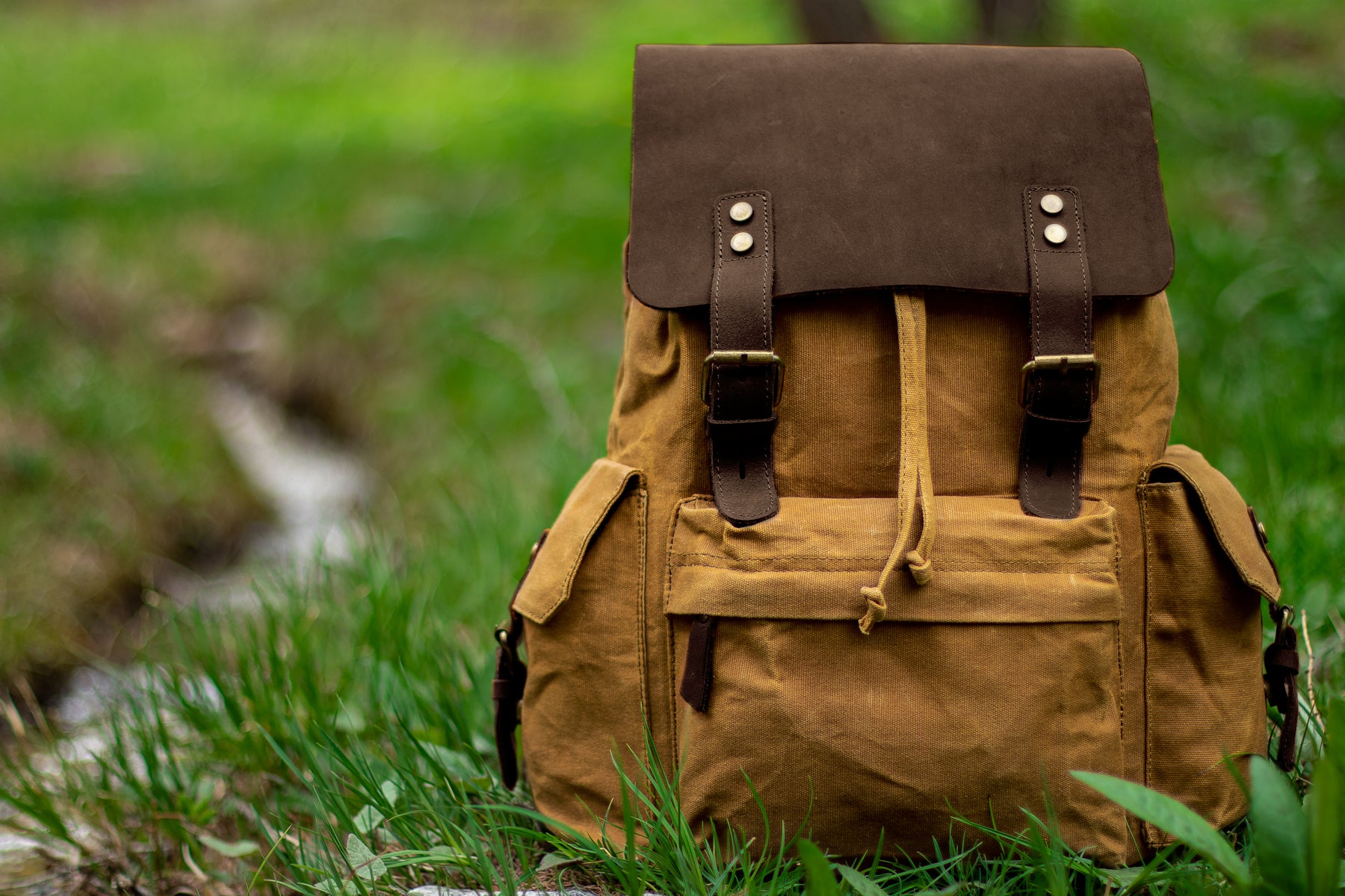 travel leather and backpack with wax coating