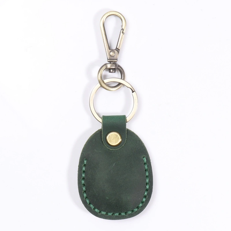 Dark green leather AirTag case keychain for everyday carry