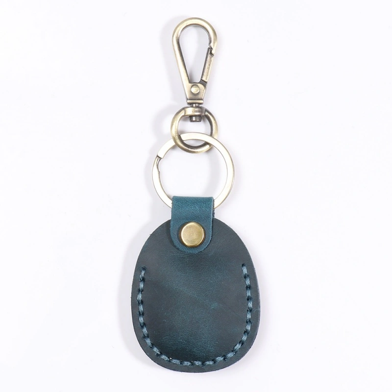 Blue leather AirTag holder keychain for bags and luggage