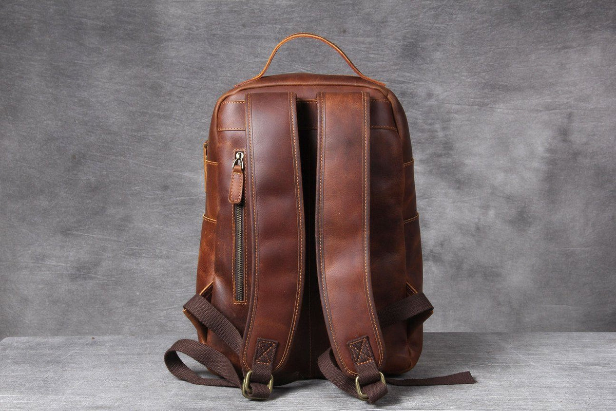 sleek small classic leather back pack