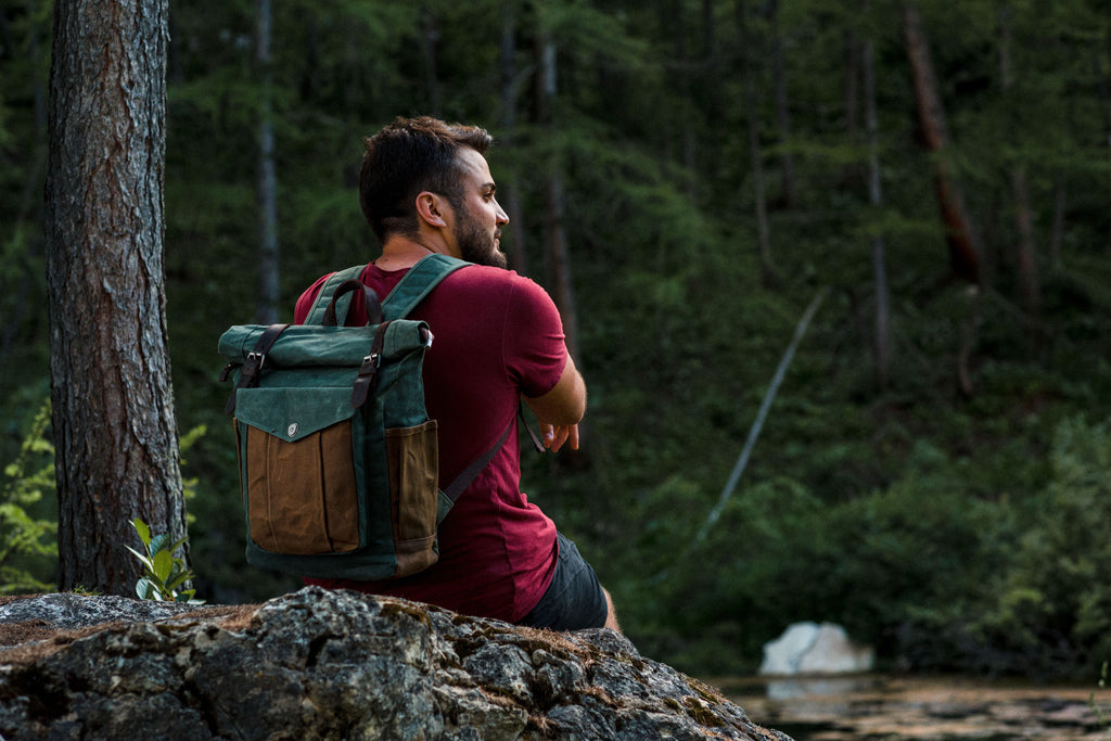 convertible mens wax canvas and leather roll top school bag to store jackets. shirts. textbooks or laptops