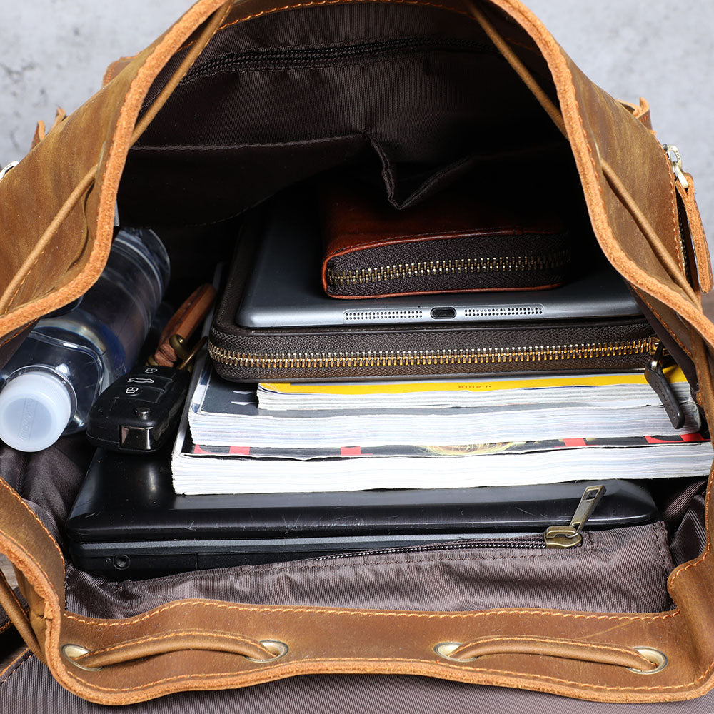 small brown leather backpack