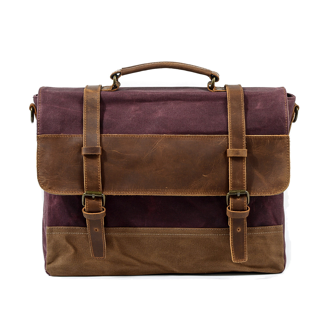 Two-tone leather and waxed canvas messenger bag resting on wood surface
