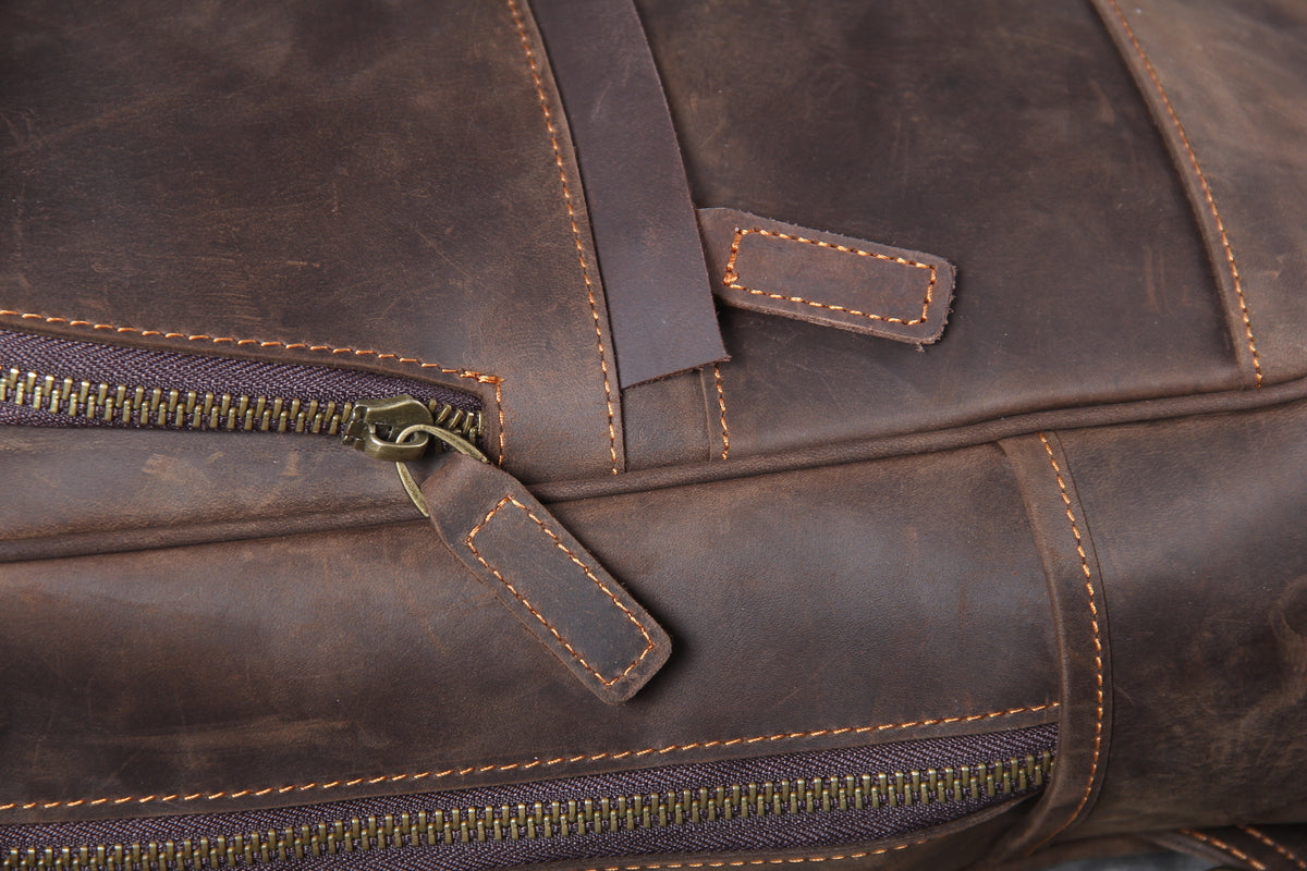 brown leather bookbag