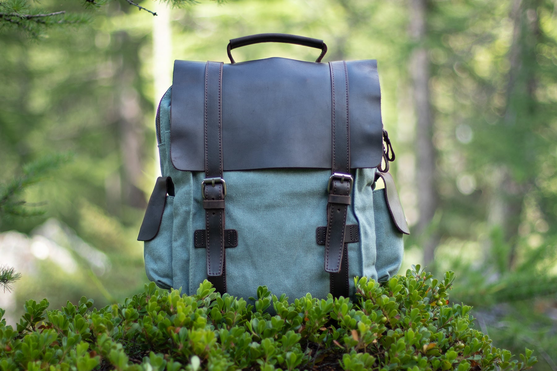 mens mini convertible canvas backpack ideal to store loungewear. underwear or footwear