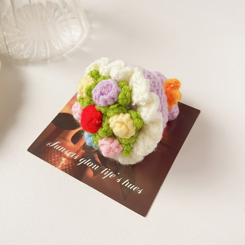 Hand-knitted mini bouquet of crocheted knitted wool roses