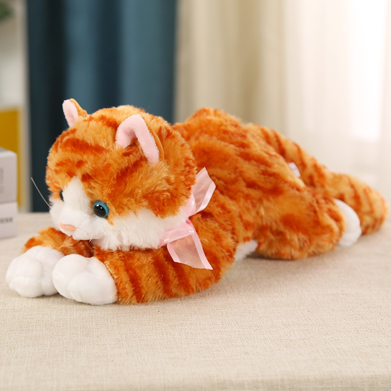 This is a lifelike plush cat toy that can meow. It's a cute cat doll in a lying position, perfect as a birthday gift for children or as a companion for sleep.