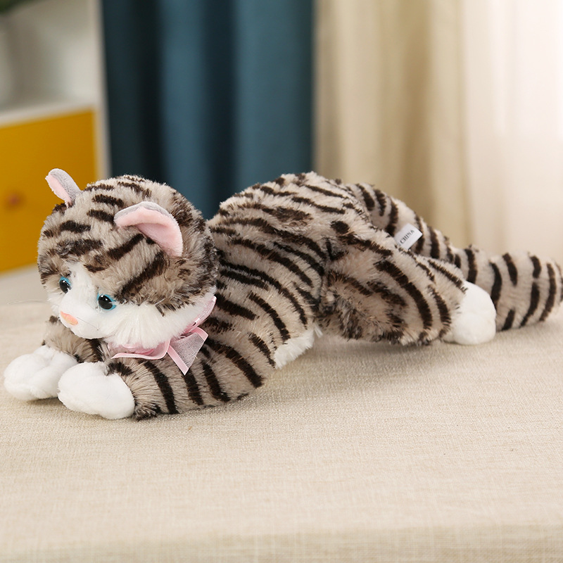 This is a lifelike plush cat toy that can meow. It's a cute cat doll in a lying position, perfect as a birthday gift for children or as a companion for sleep.