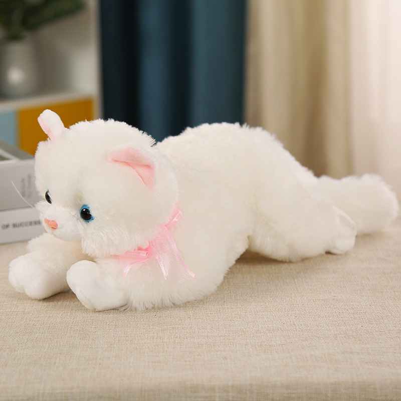 This is a lifelike plush cat toy that can meow. It's a cute cat doll in a lying position, perfect as a birthday gift for children or as a companion for sleep.