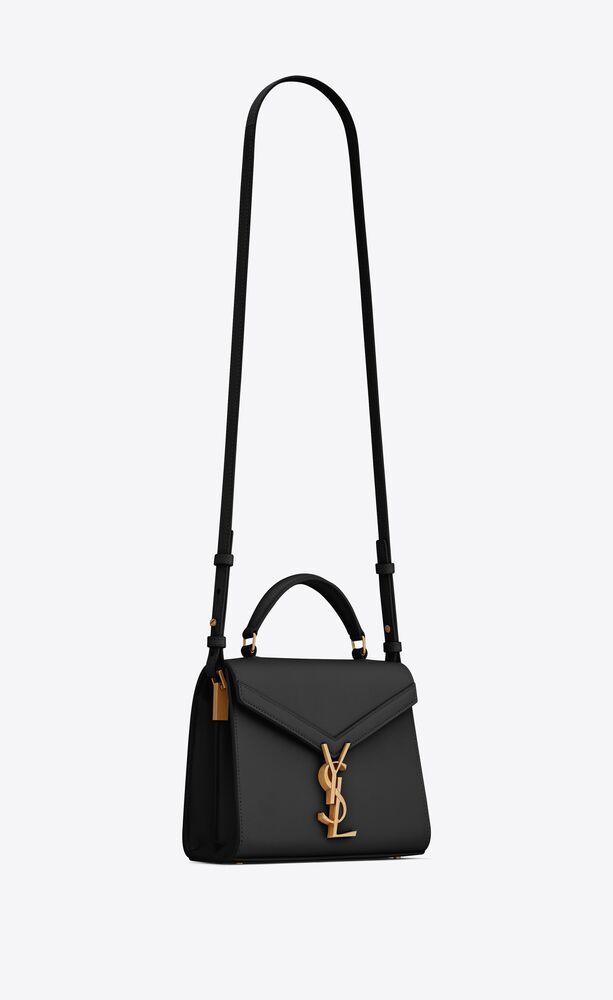 CASSANDRA MINI TOP HANDLE BAG IN GRAIN DE POUDRE EMBOSSED LEATHER