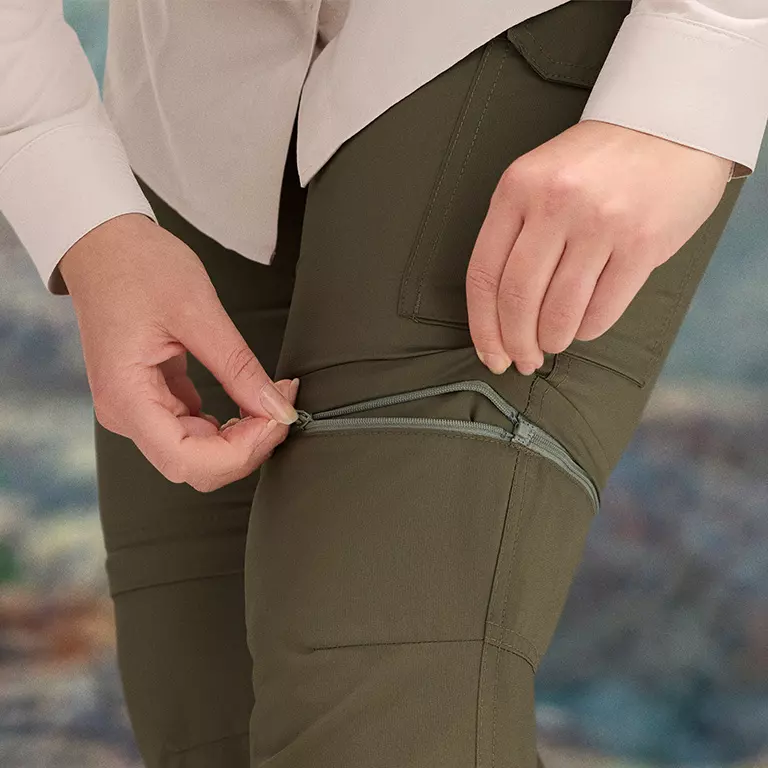 Close-up of a model showing the zip off convertible legs 