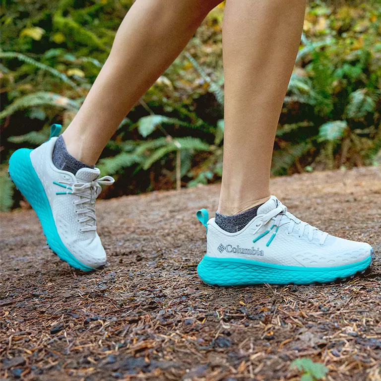 A close up view of the Konos sneaker on foot.