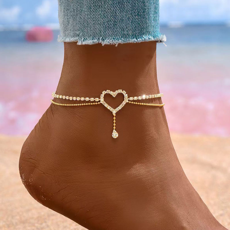 Diamond-encrusted heart-shaped anklet