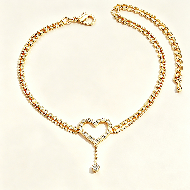 Diamond-encrusted heart-shaped anklet