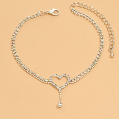 Diamond-encrusted heart-shaped anklet