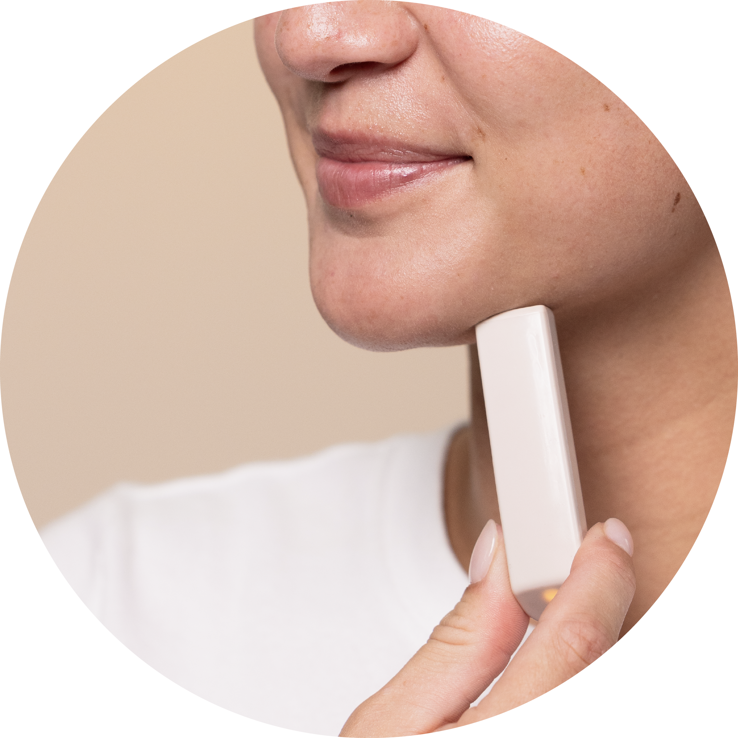 {"default":"a female model using the wand of the boldhue device to scan her chin"}
