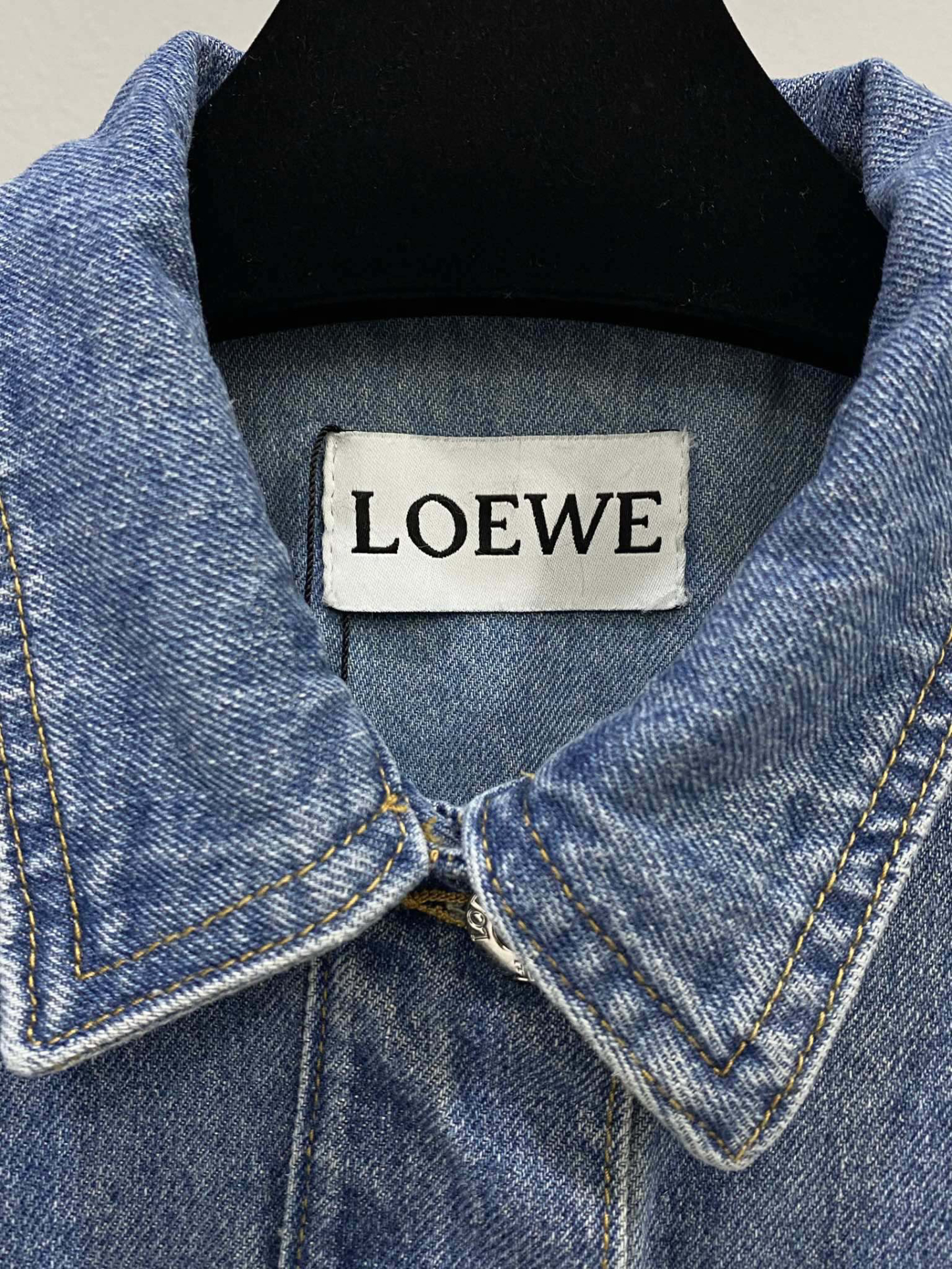 LOE25SS leather embossed logo denim jacket