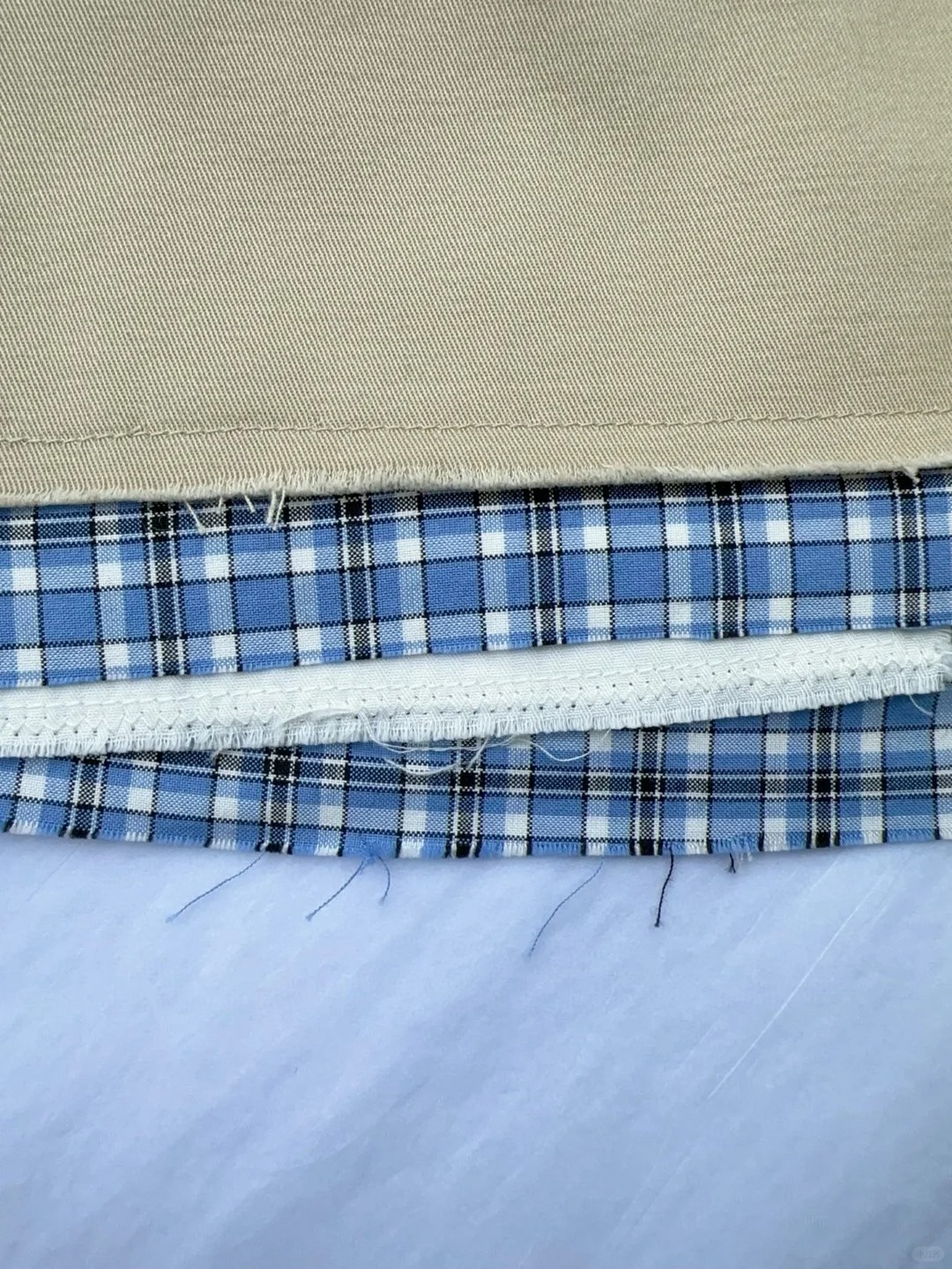 MIU25SS Plaid Patchwork Embroidered Letter Half Skirt