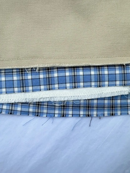 MIU25SS Plaid Patchwork Embroidered Letter Half Skirt