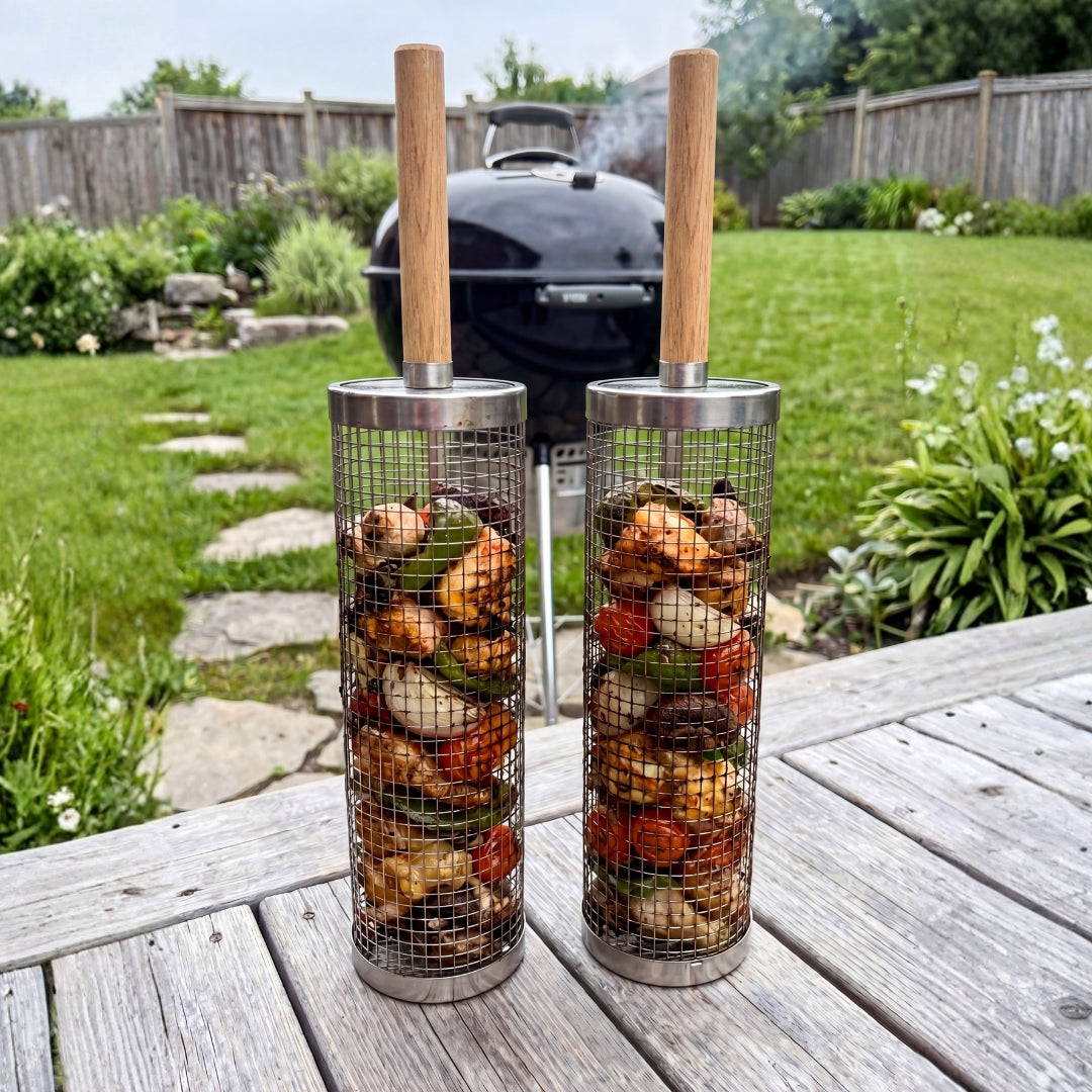 Upright mesh grill baskets filled with vegetables