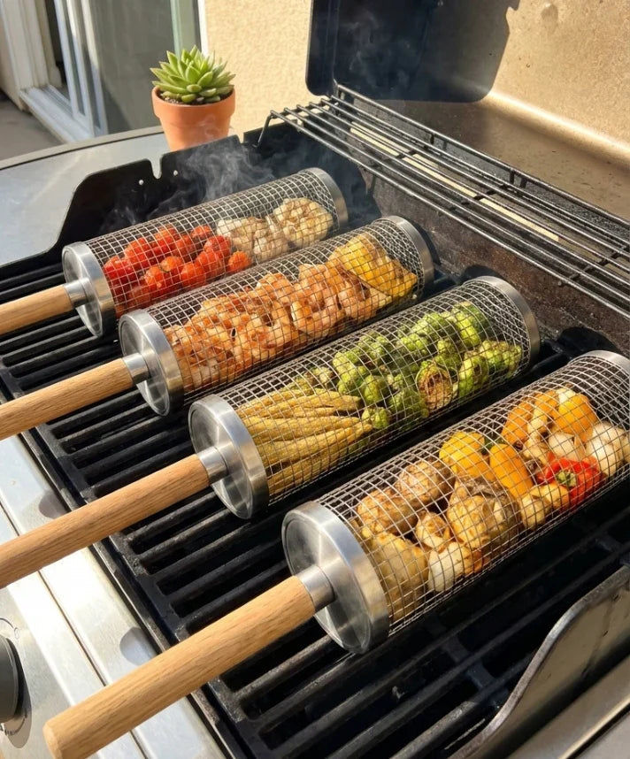 Several rolling grill baskets on a barbecue with mixed ingredients