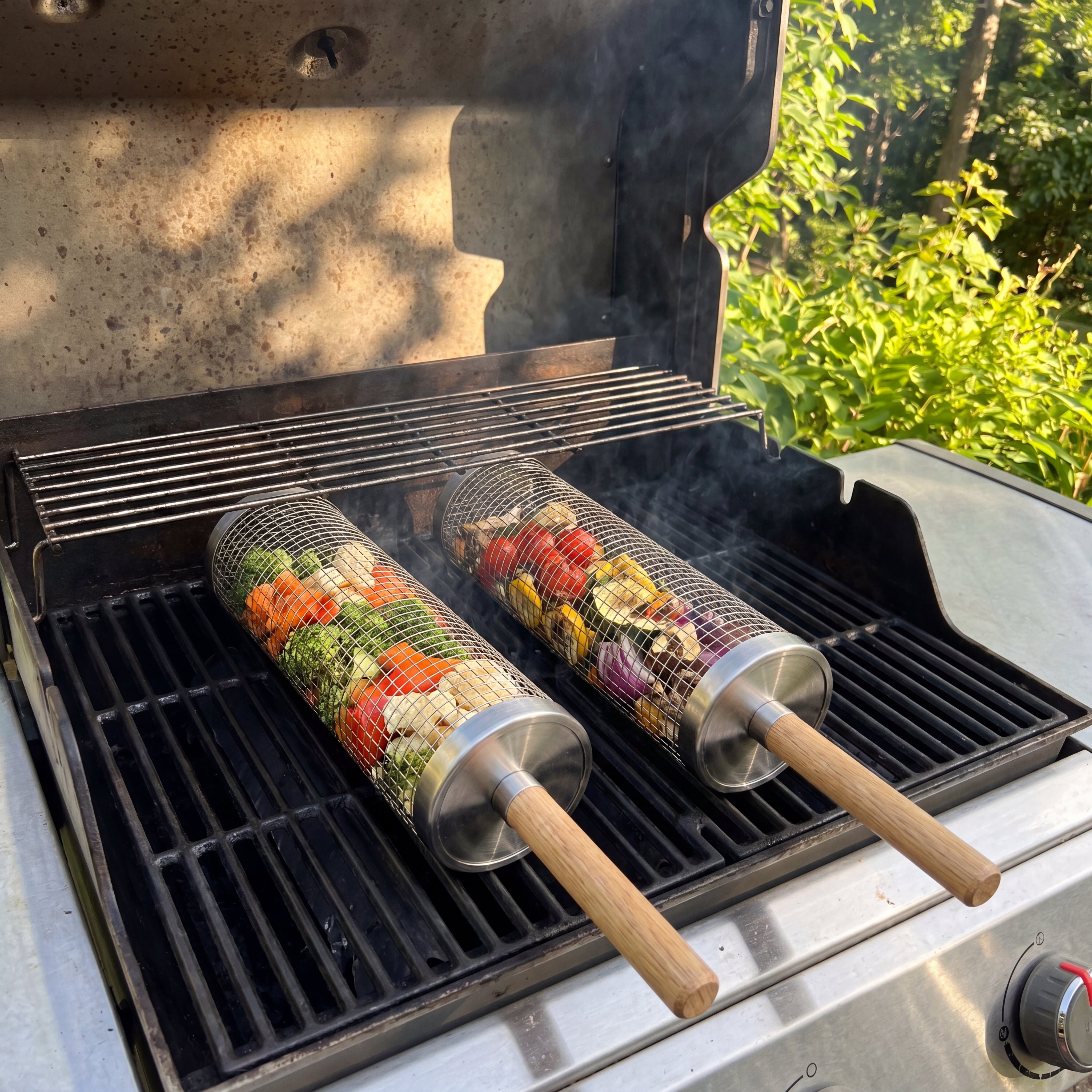 Two filled rolling baskets placed on a barbecue grill