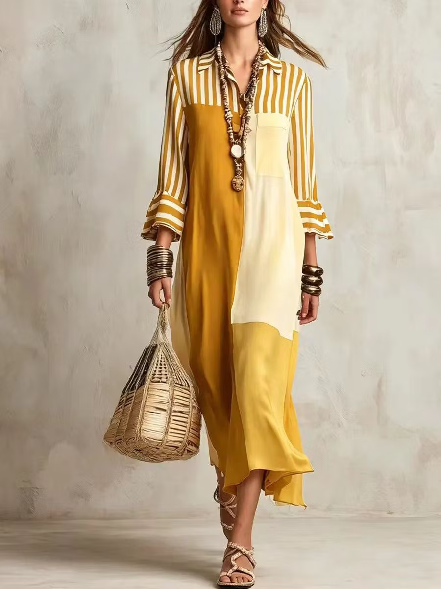 Modern and elegant striped shirt-dress for women, with ¾ length sleeves and a patchwork pattern.