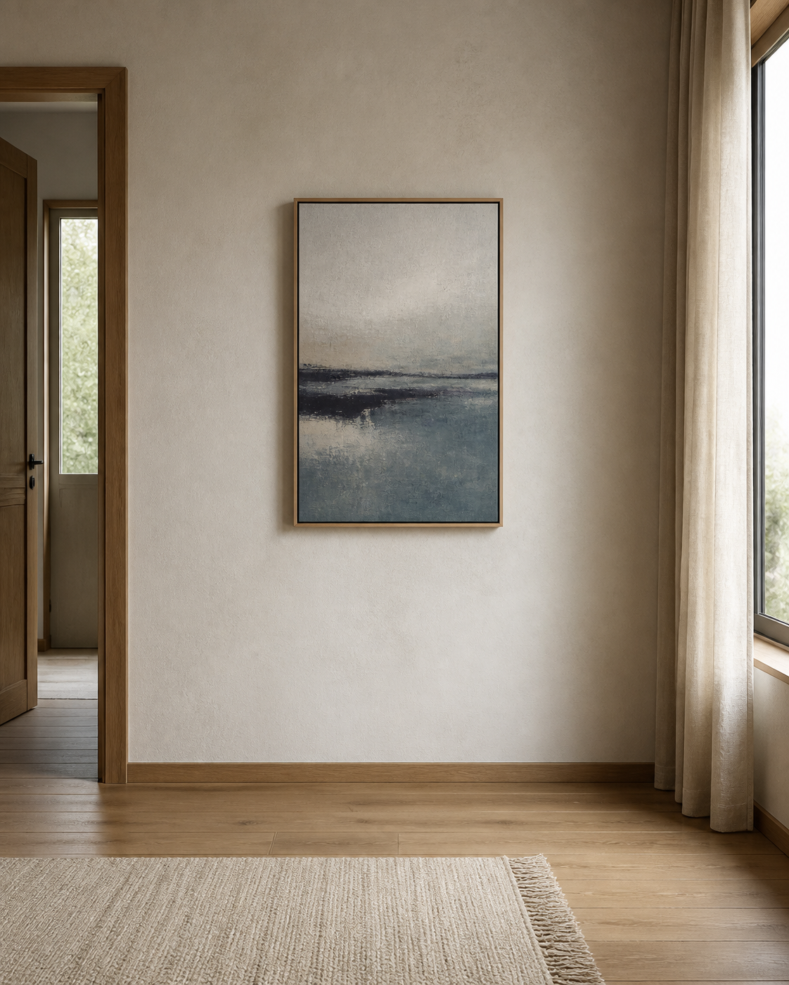 A single artwork creates a viewing center on an unfurnished bedroom wall.