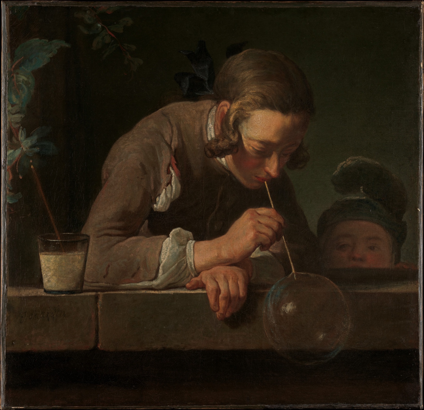 A boy blows a transparent soap bubble beside a stone ledge, with another child watching.