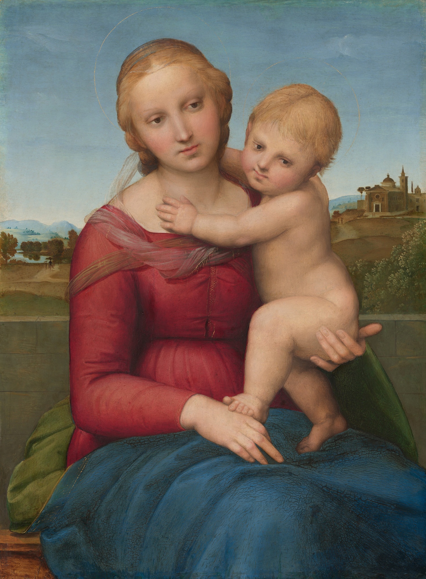 A seated woman in a red dress and blue drapery holds a nude child in a bright landscape, with softly shaded faces, arms and torso.