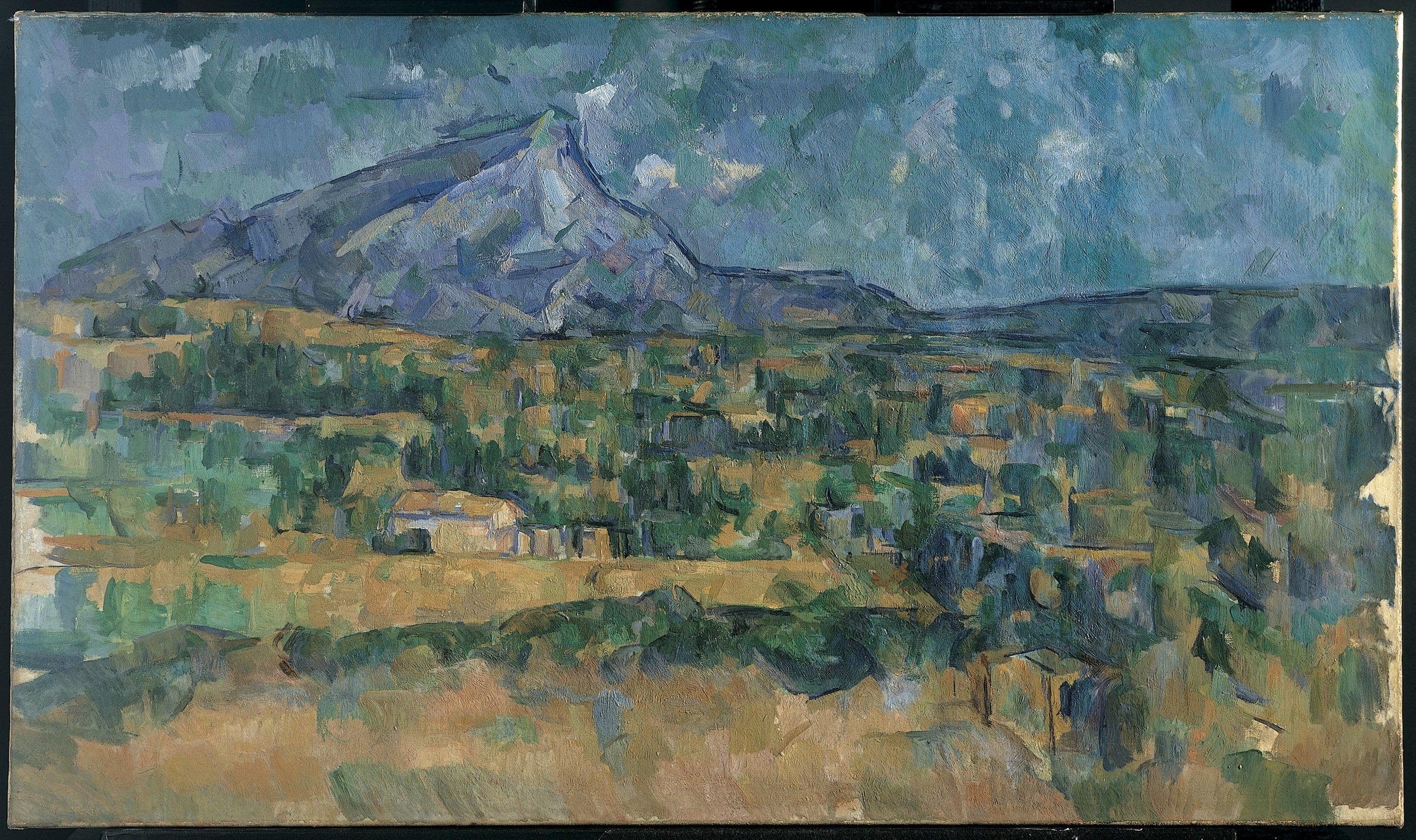 A blue-gray mountain rises above a valley assembled from green, ochre and blue painted patches.