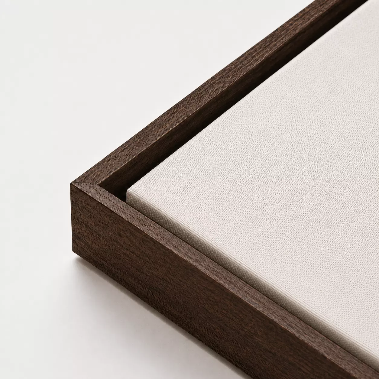 Black walnut floating canvas with a solid-wood outer frame