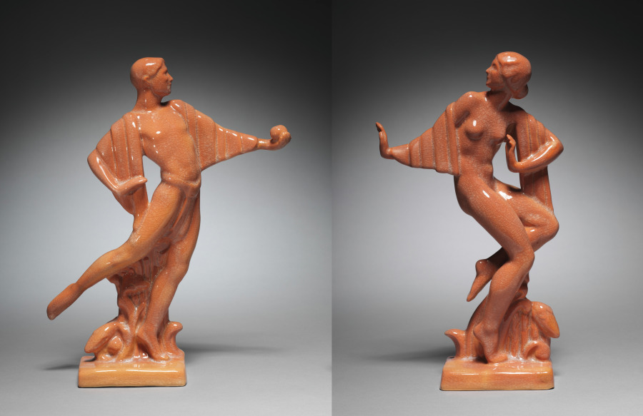 R. Guy Cowan's pair of orange glazed ceramic figures Adam and Eve from 1928, with elongated poses and rhythmic drapery.