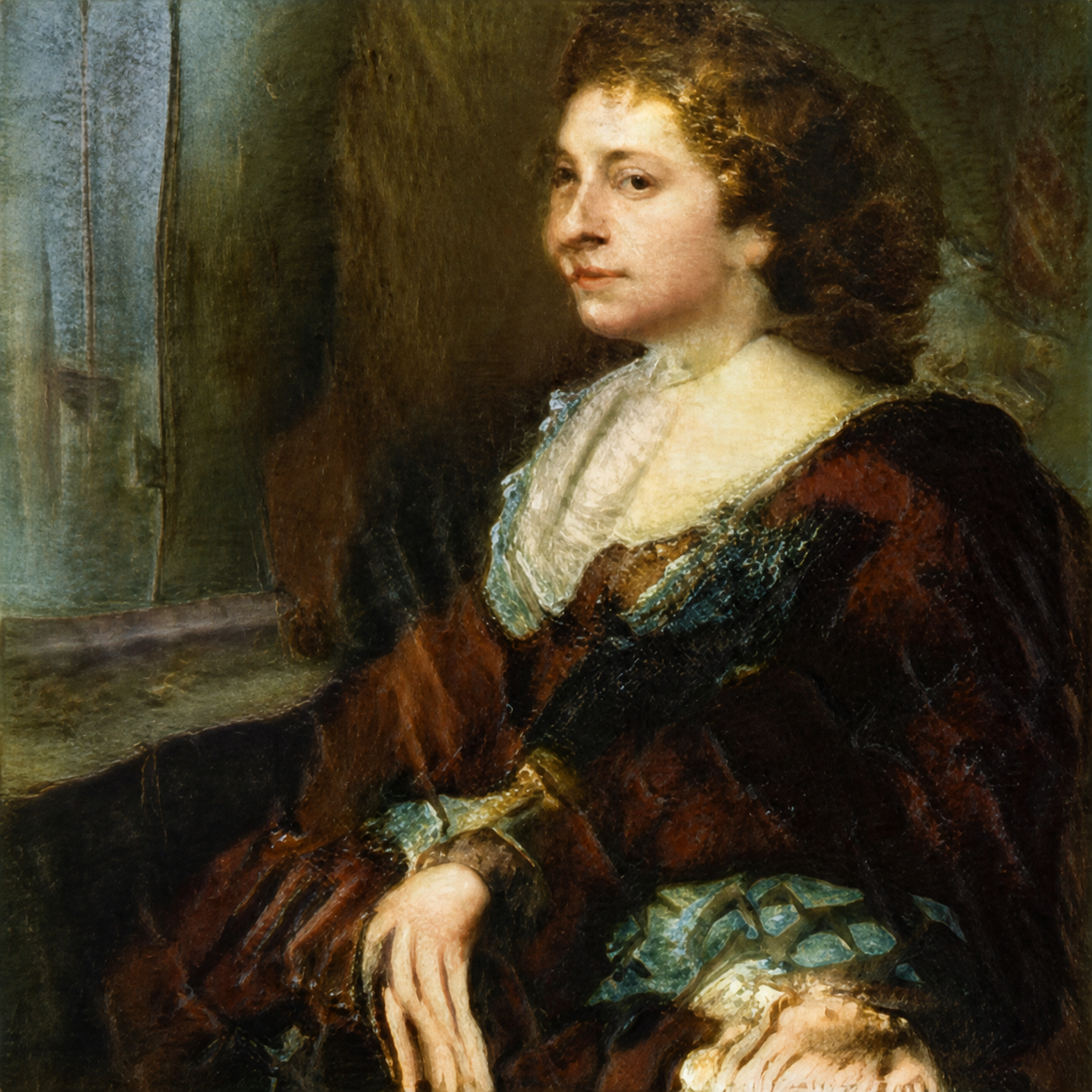 A dark-haired woman with a softly modelled face and bright hands, wearing patterned fabric beside a window and column.